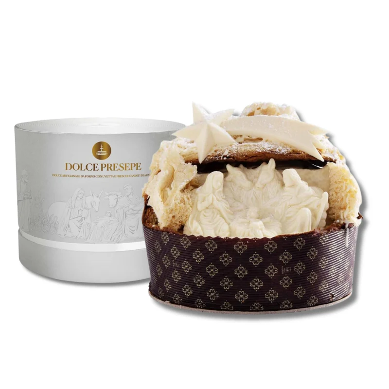 DOLCE PRESEPE: Frische Panettone Gechmück mit einer Krippe mit Figuren aus weißer Schokolade.
