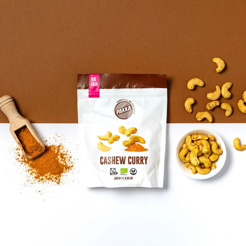 PAKKA BIO Gewürzte Cashews mit Curry Madras, Salz und Malabar Pfeffer - 100g